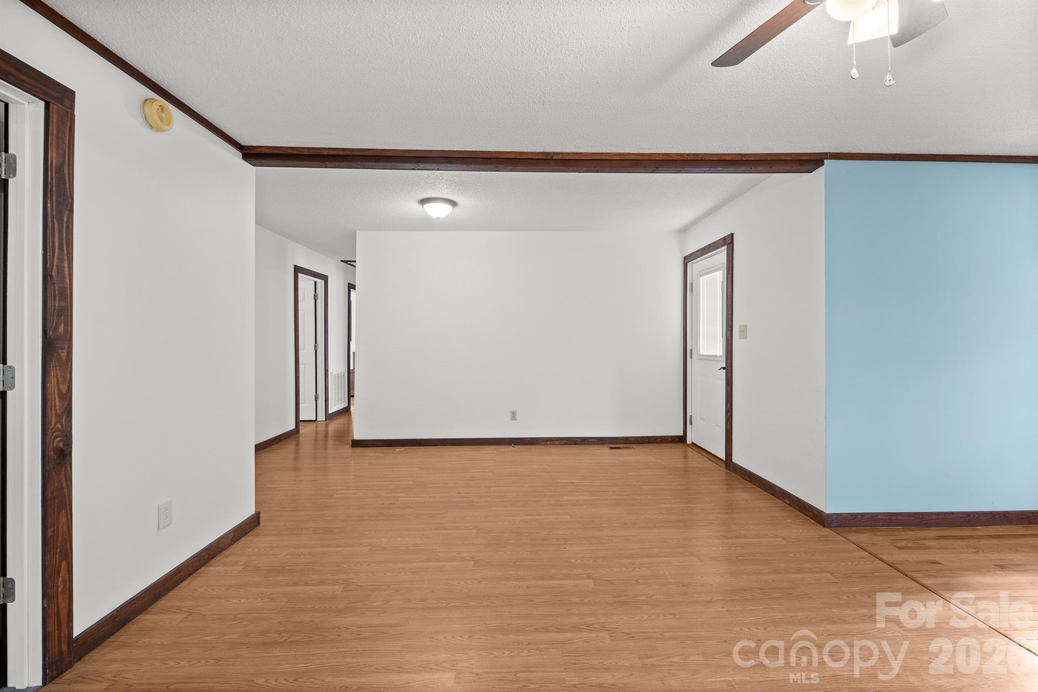 7400 Corn Hill Road Connelly Springs, NC 28612 - Photo 13 of 41 a view of a hallway with wooden floor