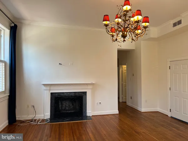 a living room with wooden floor