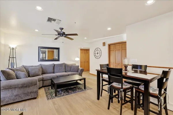 a living room with furniture and a table