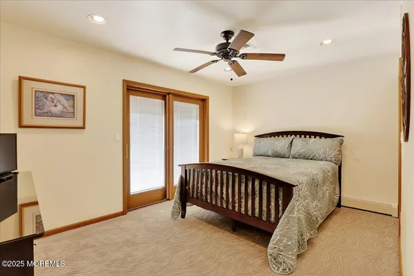 a view of a hallway with a bedroom