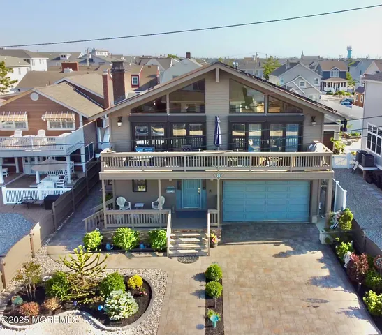 a aerial view of a house with a garden and plants