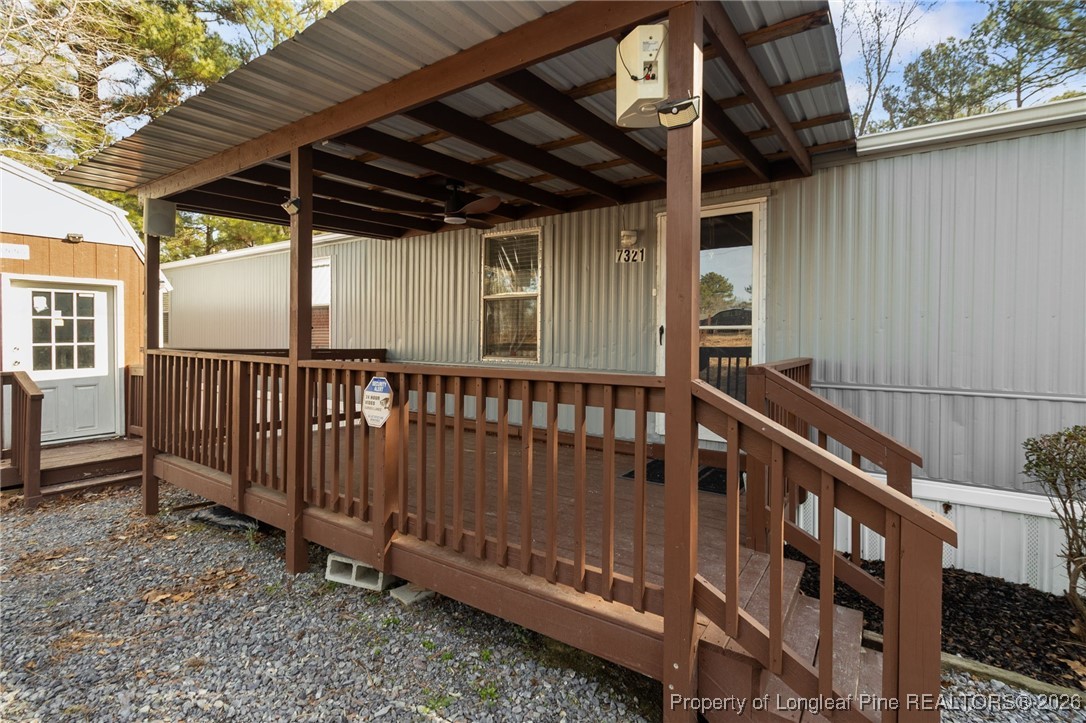 7321 Sheriff Watson Road Sanford, NC 27332 - Photo 2 of 26 a view of wooden balcony
