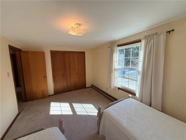 a view of empty room with windows