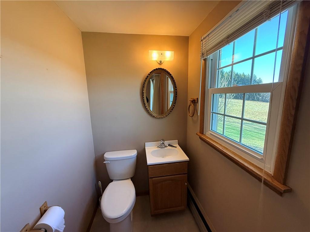 88 Shaffer Drive Indiana, PA 15701 - Photo 13 of 29 a bathroom with a toilet a sink and a window