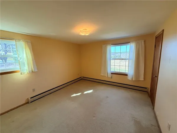 an empty room with windows