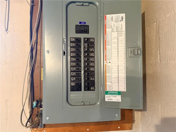 a view of front door with wooden floor