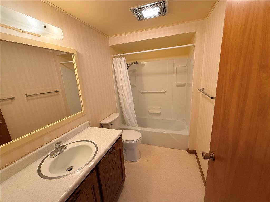 88 Shaffer Drive Indiana, PA 15701 - Photo 8 of 29 a bathroom with a sink a toilet and shower