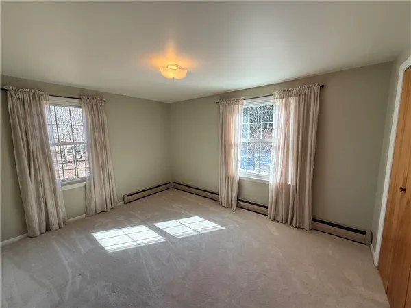 an empty room with windows