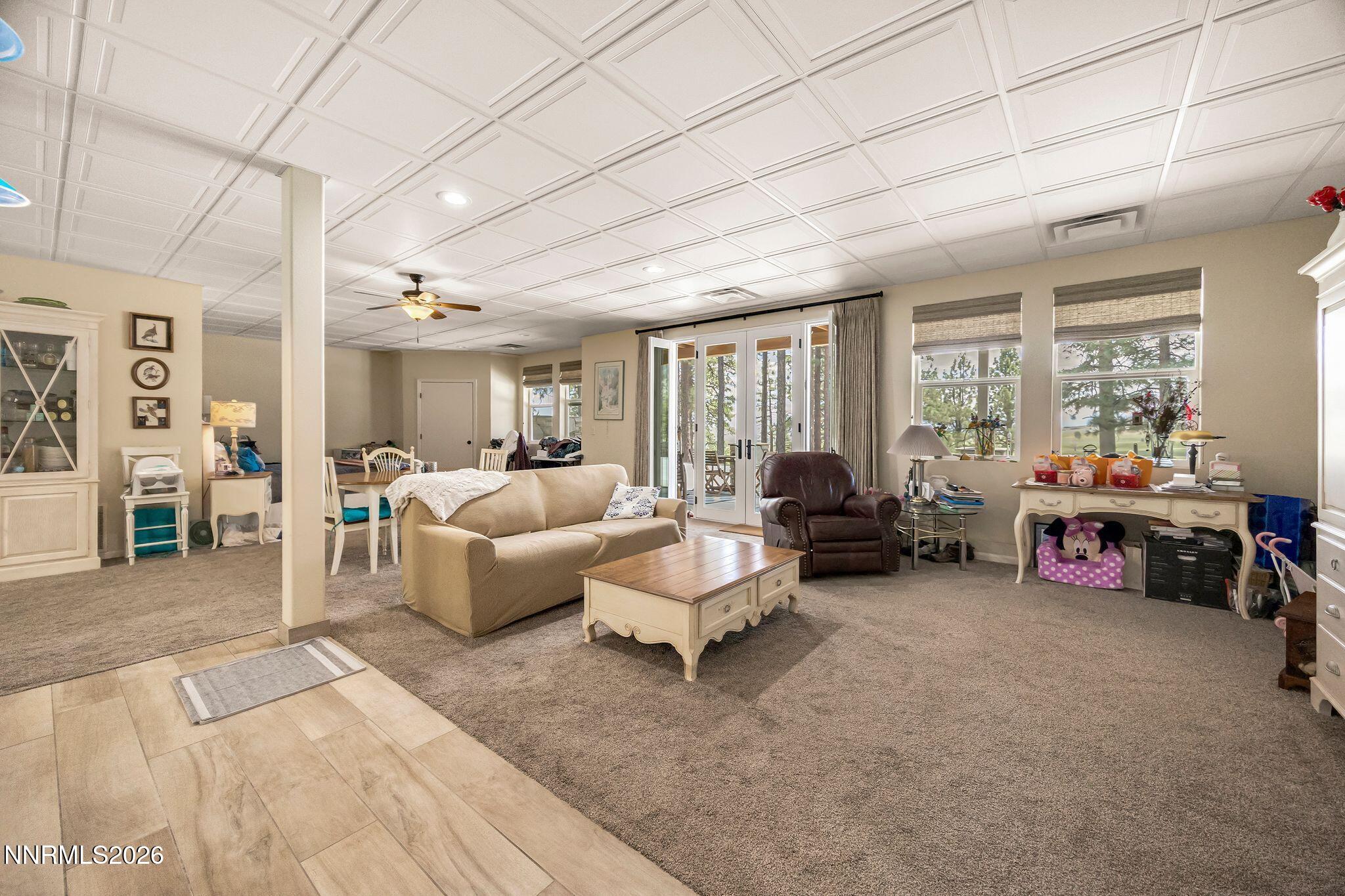 250 Jacks Valley Ranch Road Carson City, NV 89705 - Photo 22 of 44 a living room with furniture and a large window