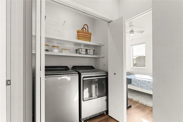 a kitchen with a stove and a refrigerator