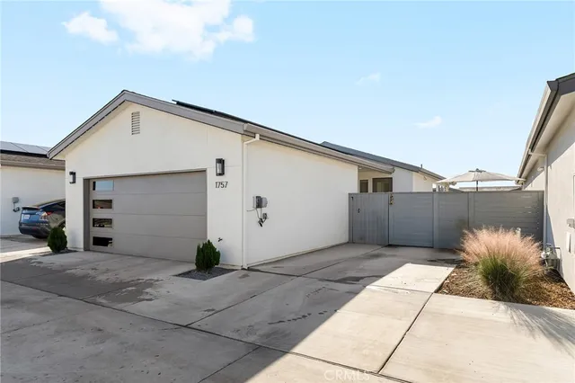 a view of a back yard of the house