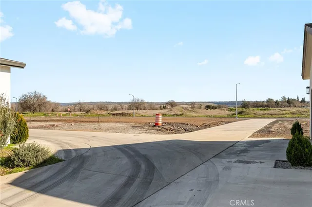 a view of a swimming pool with an outdoor seating