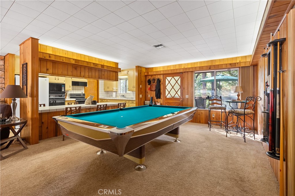 25220 Rim Rock Road Idyllwild, CA 92549 - Photo 12 of 55 a room with pool table and windows