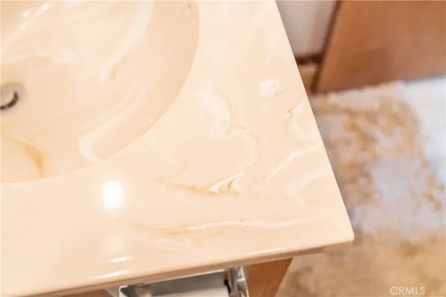 a view of a hallway with closet and a livingroom view