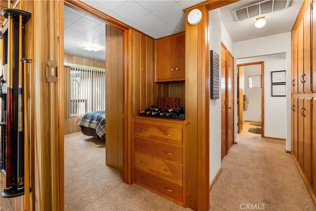 a bedroom with bed and window