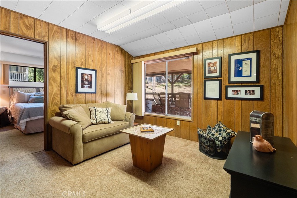 25220 Rim Rock Road Idyllwild, CA 92549 - Photo 25 of 55 a living room with furniture flowerpot and window