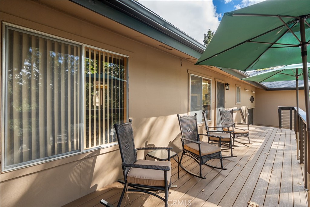 25220 Rim Rock Road Idyllwild, CA 92549 - Photo 44 of 55 a view of a chairs and table in the balcony