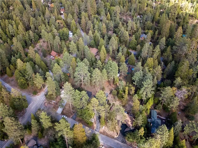 a view of a yard with mountains in the background