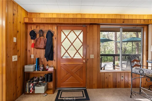 a spacious bedroom with a large bed and a large window