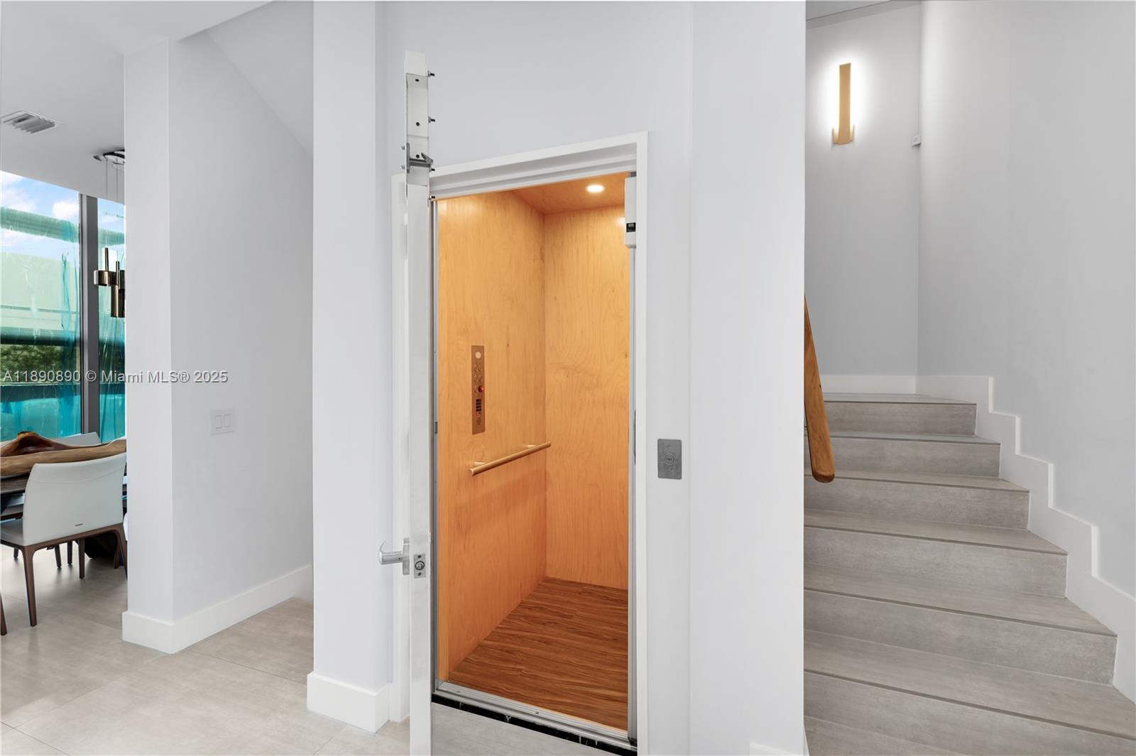 650 Northeast 32nd Street, Unit BH7 Miami, FL 33137 - Photo 21 of 53 a view of entryway and hall with wooden floor