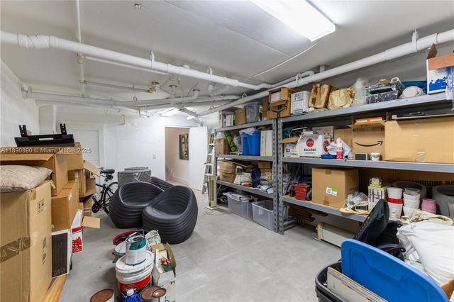 a room with lots of furniture and clutter