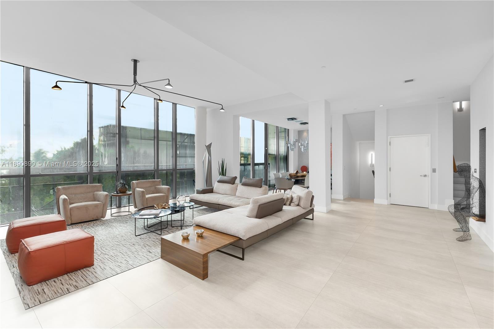 650 Northeast 32nd Street, Unit BH7 Miami, FL 33137 - Photo 49 of 53 a living room with furniture and a large window