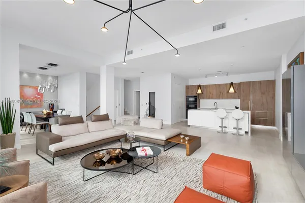 a room with furniture and wooden floor