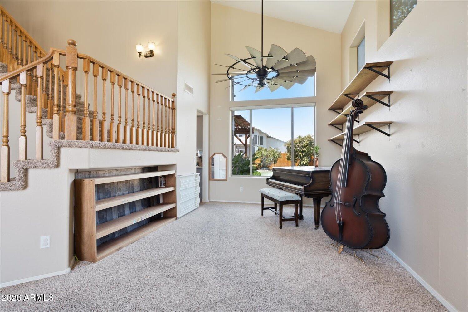 1894 East Mineral Road Gilbert, AZ 85234 - Photo 4 of 48 a view of a livingroom with furniture and a chandelier