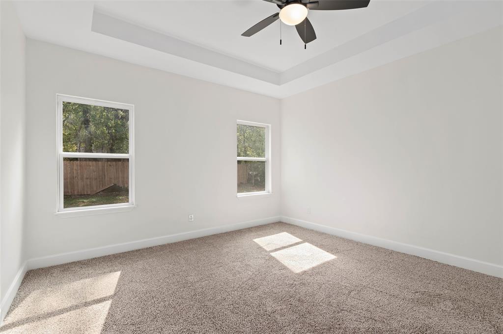 1520 Harris Street Gainesville, TX 76240 - Photo 17 of 24 an empty room with a window