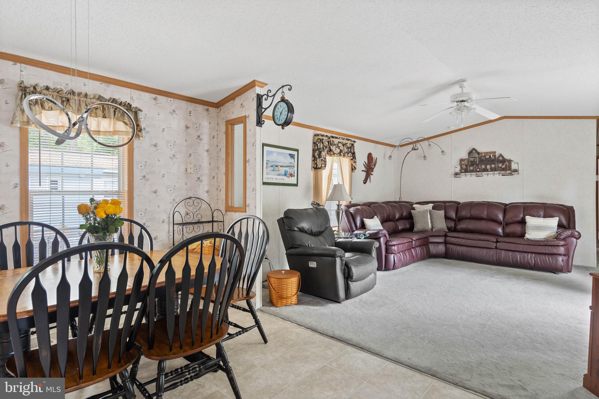 25754 Blue Ridge Street Millsboro, DE 19966 - Photo 17 of 32 a living room with furniture and wooden floor