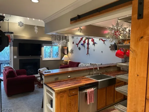 a kitchen with a stove and a sink