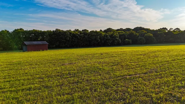 a view of an ocean and sunset