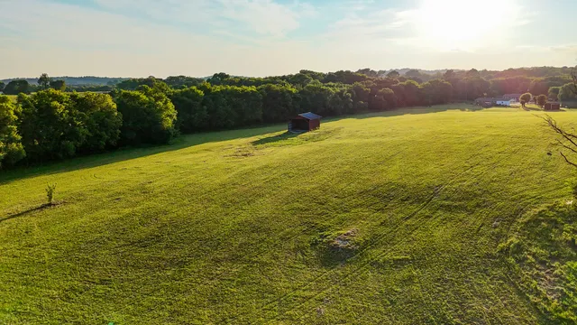 a view of an ocean from a mountain