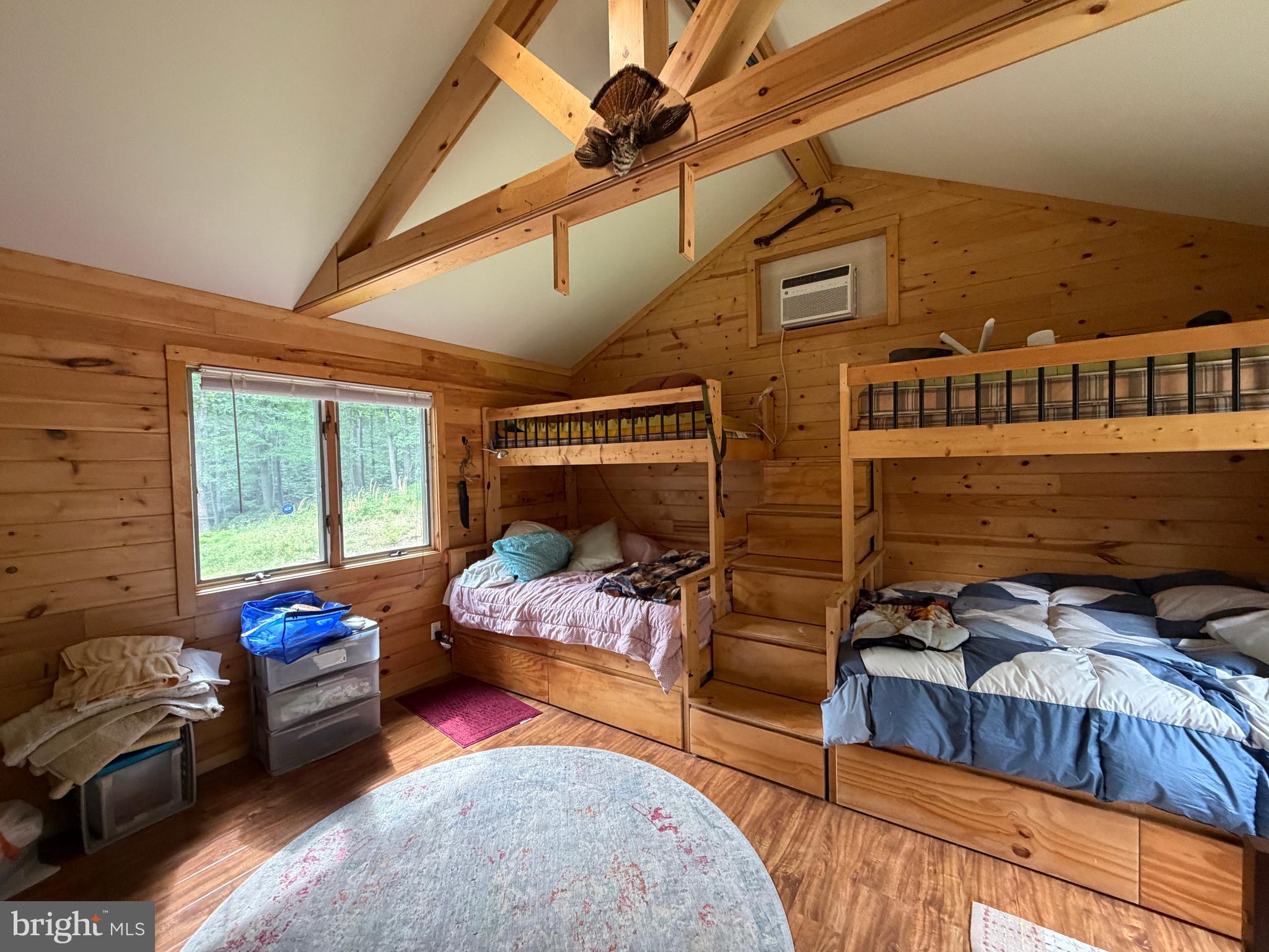 1419 Paul's Woods Road Delray, WV 26714 - Photo 32 of 105 a bedroom with furniture and a couch