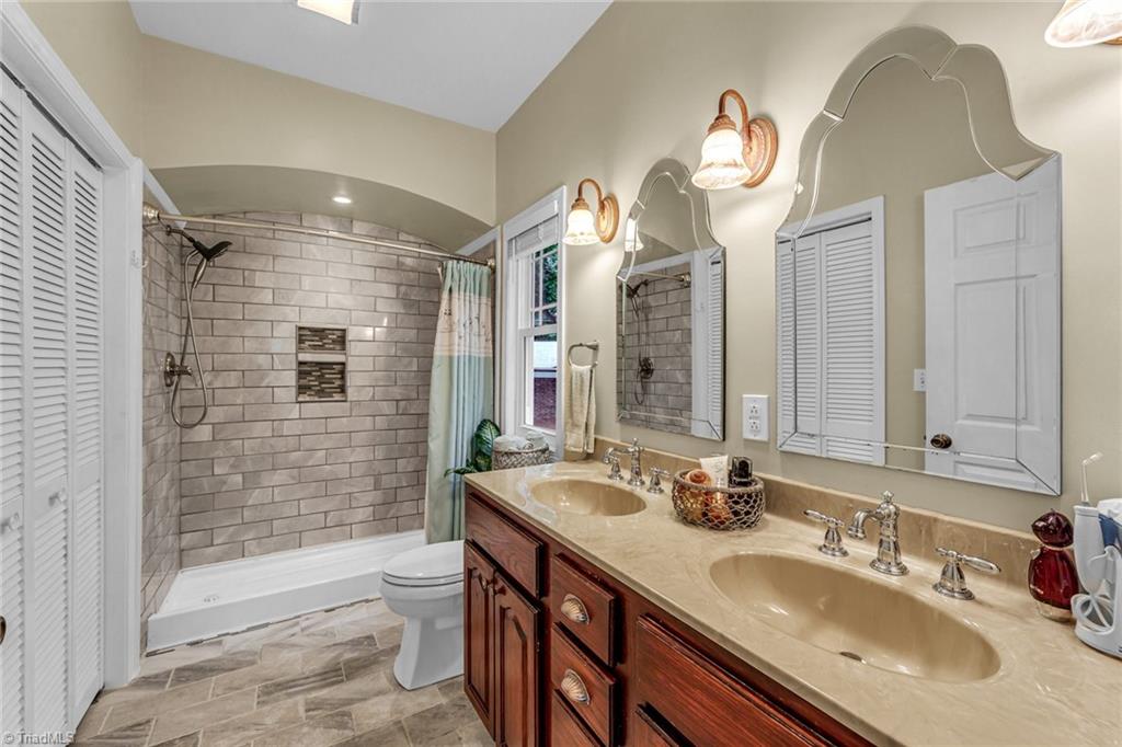 1724 Warf Road Lexington, NC 27292 - Photo 23 of 44 Dual sinks and an archway over the shower entrance!