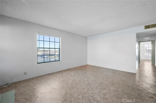 an empty room with windows