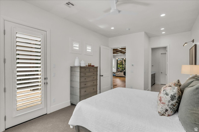 2608 Canyon Ridge Drive St. George, UT 84770 - Photo 26 of 86 Bedroom featuring a white door with louvered panels, light gray carpeting, recessed ceiling lighting, and a ceiling fan
