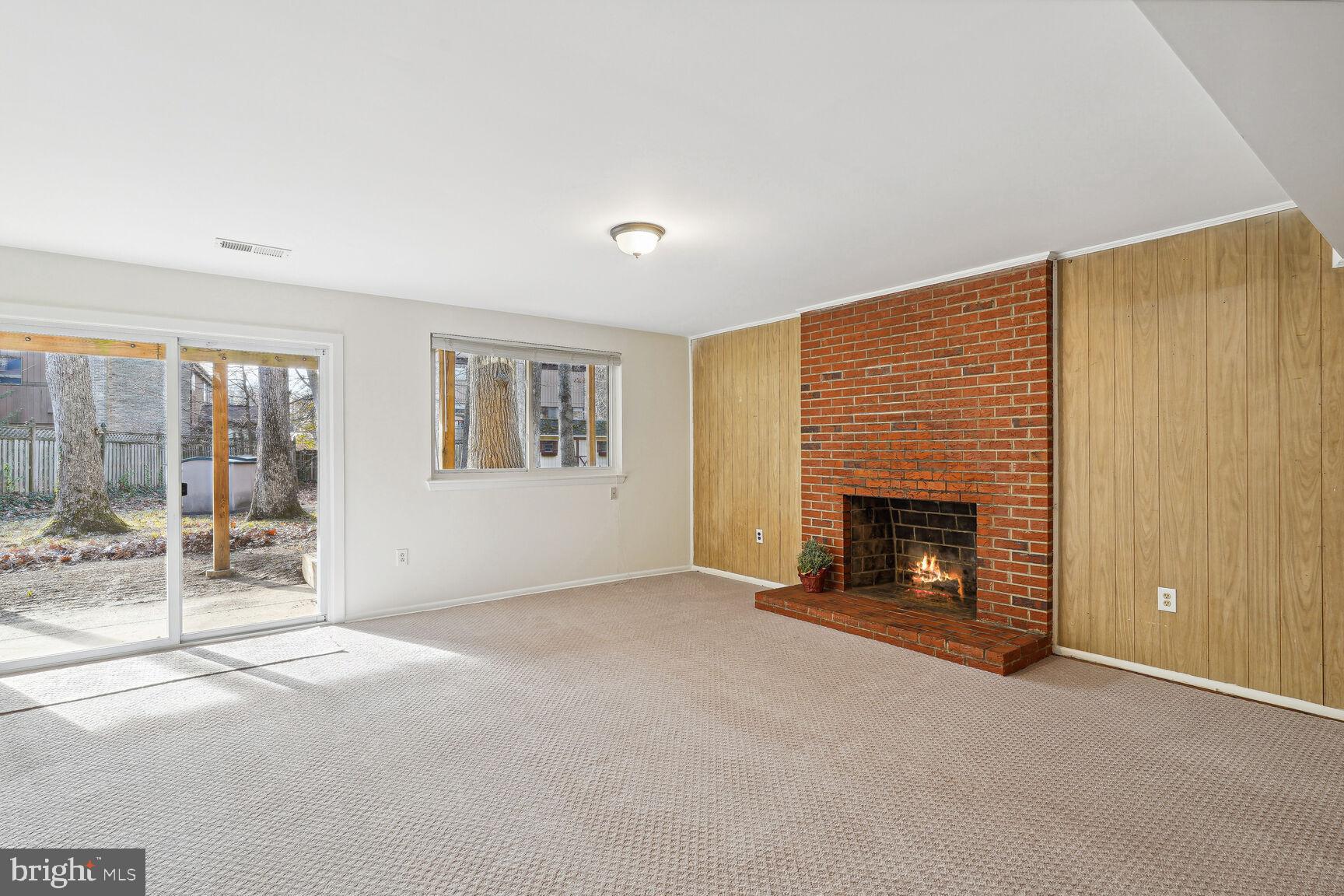 6420 Hollins Drive Bethesda, MD 20817 - Photo 22 of 34 Large downstairs newly carpeted walkout