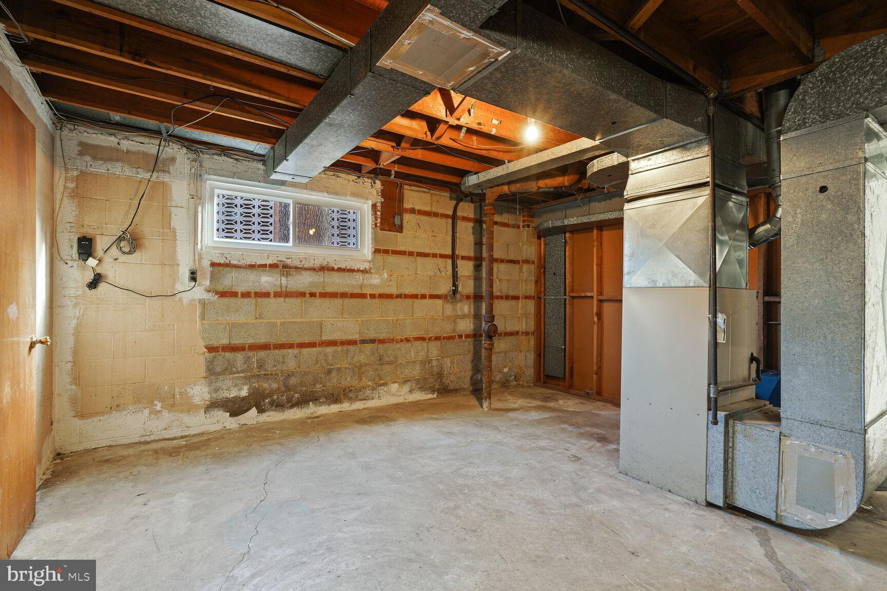 6420 Hollins Drive Bethesda, MD 20817 - Photo 28 of 34 large furnace room . Downstairs gym????