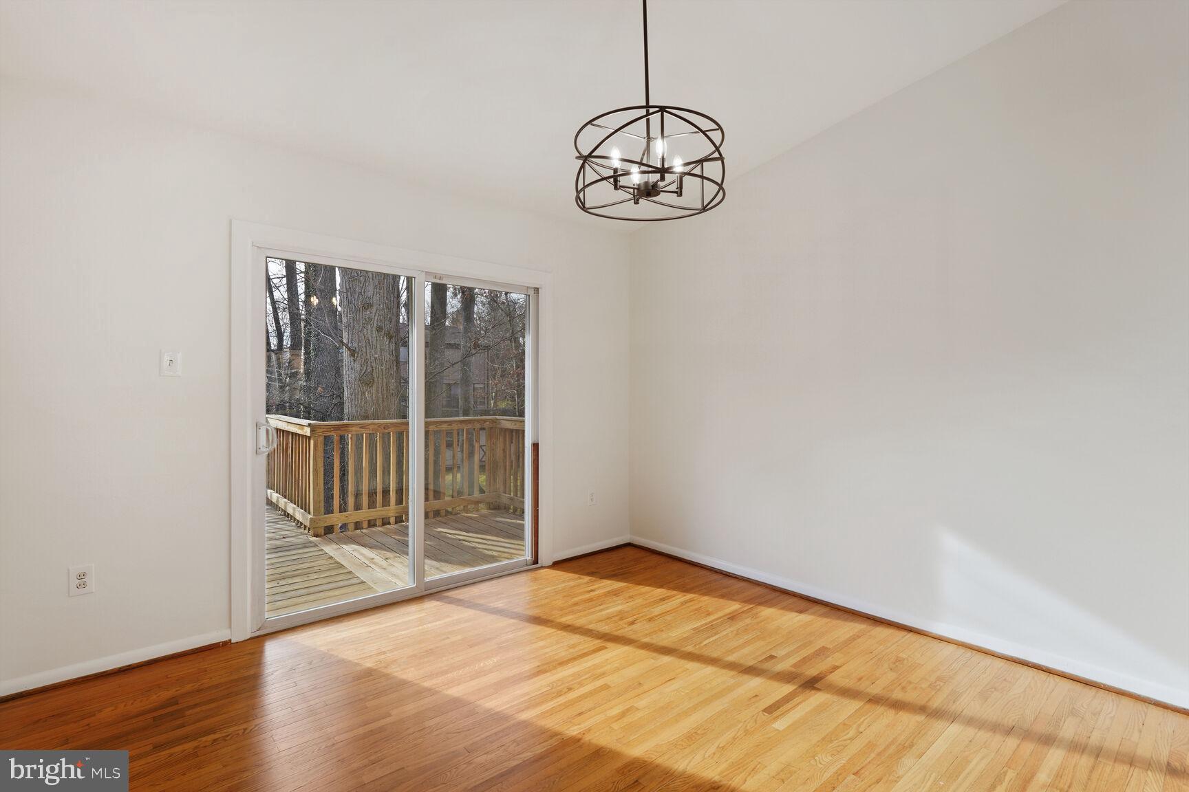 6420 Hollins Drive Bethesda, MD 20817 - Photo 7 of 34 Sliding door to large deck