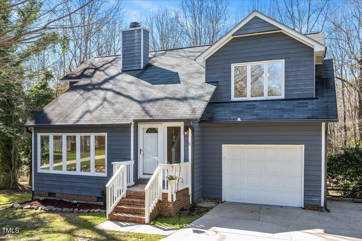 4201 Loon Lane Raleigh, NC 27616 - Photo 1 of 31 a front view of a house with a yard