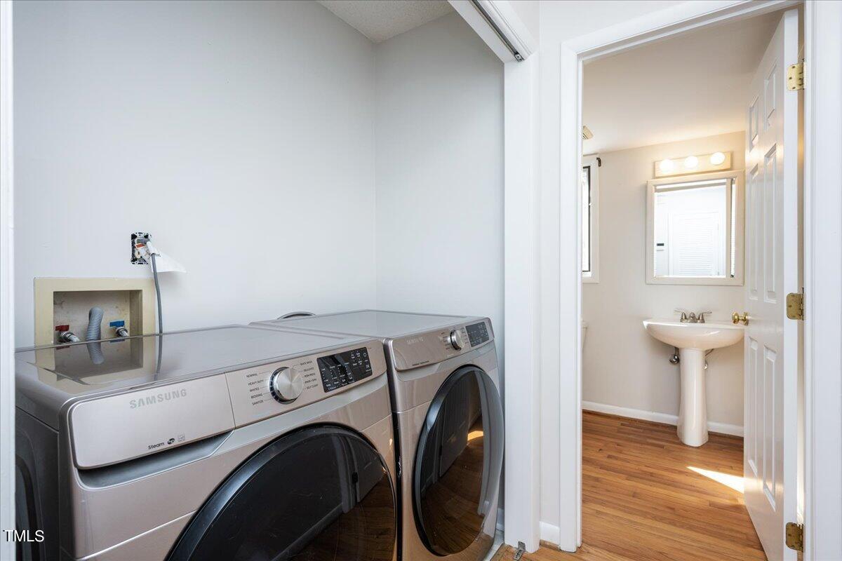 4201 Loon Lane Raleigh, NC 27616 - Photo 14 of 31 a view of livingroom with washer and dryer