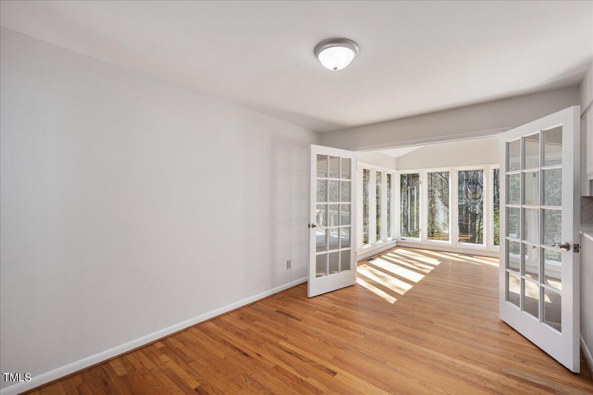 4201 Loon Lane Raleigh, NC 27616 - Photo 25 of 31 a view of wooden floor and windows in a room