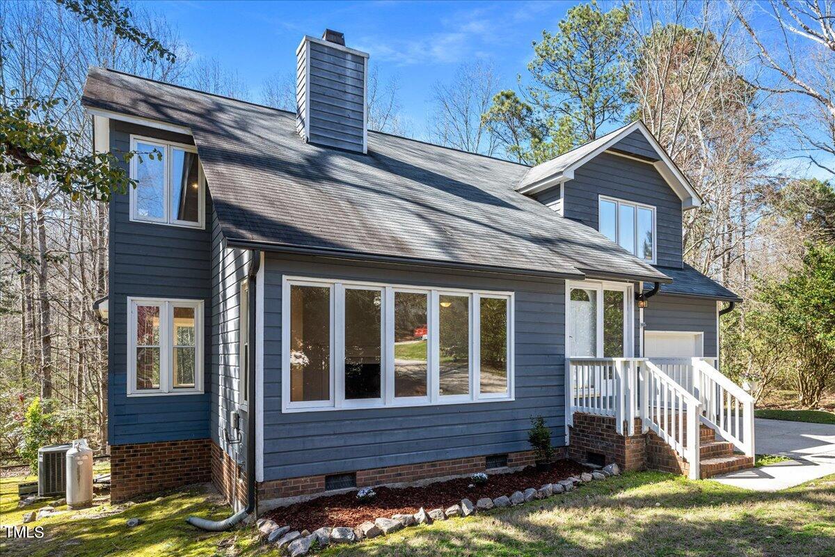 4201 Loon Lane Raleigh, NC 27616 - Photo 3 of 31 front view of house with a yard