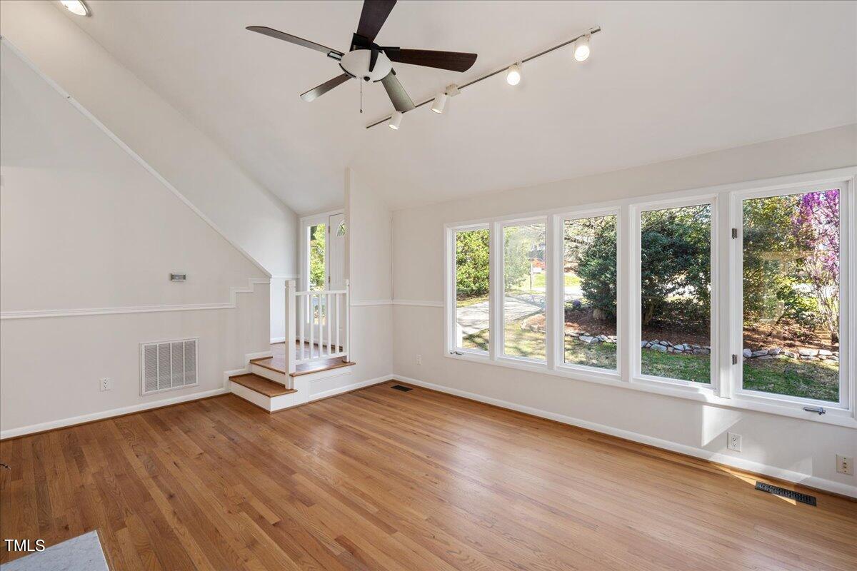 4201 Loon Lane Raleigh, NC 27616 - Photo 6 of 31 a view of livingroom with hardwood floor and window