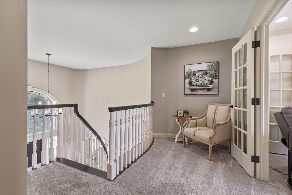 2570 Jewett Road Powell, OH 43065 - Photo 42 of 104 • Grey carpet • Grey painted walls • Can lighting • Lighted wall sconce