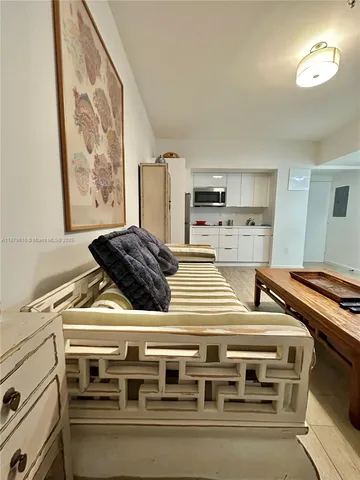 a stove top oven sitting inside of a kitchen