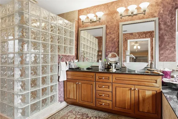 a kitchen with a sink and a window
