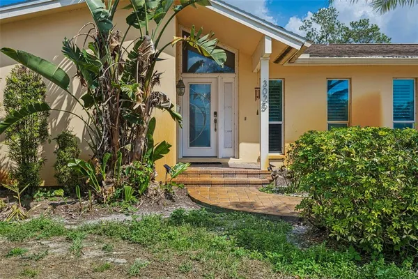 front view of a house with a yard