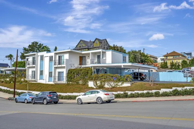 a car parked in front of a house